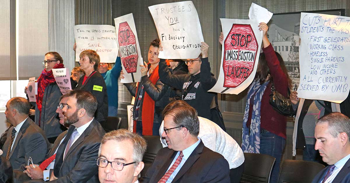 Demonstrators inside the meeting of the UMass Board of Trustees finance committee demanded a response to their request that the board use $5 million from a $96 million unrestricted reserve fund to save jobs and programs.